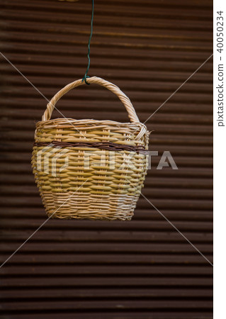 Empty wicker basket for sale in a market place Empty wicker basket for sale in a market place 40050234