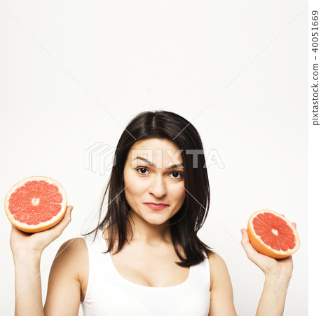 beauty young woman with grapefruit isolated close up 40051669