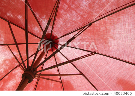 under the red beach umbrella under the red beach umbrella 40053400