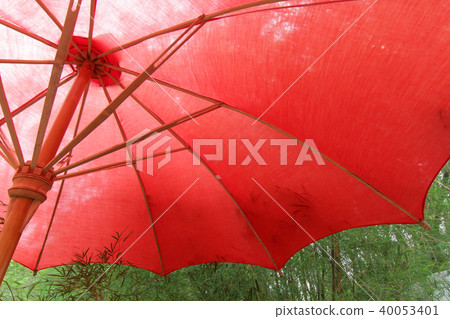 under the red beach umbrella 40053401
