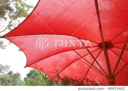 under the red beach umbrella under the red beach umbrella 40053402
