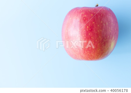 Apple, blue background, pop image 40056178