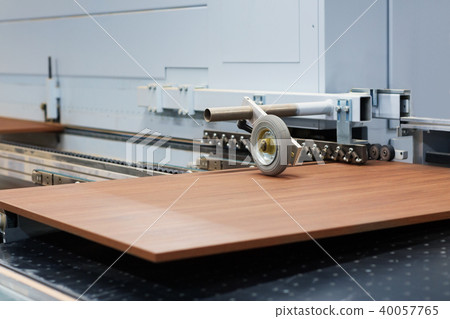 wooden board on conveyer at furniture factory 40057765
