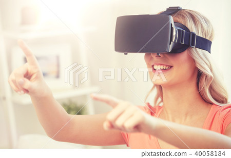 woman in virtual reality headset or 3d glasses 40058184