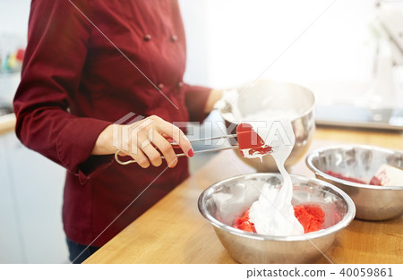 chef making macaron batter at kitchen chef making macaron batter at kitchen 40059861