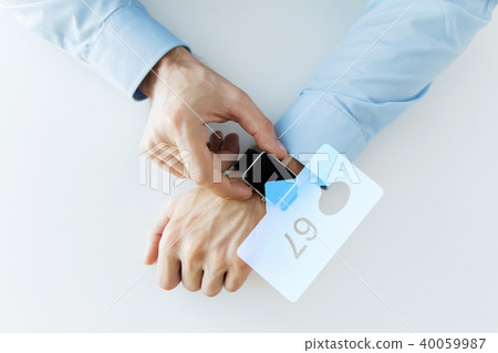 hands with smart watch and social media icons 40059987