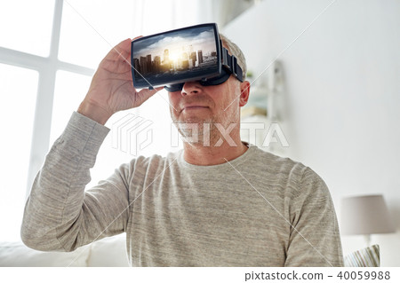 old man in virtual reality headset or 3d glasses 40059988