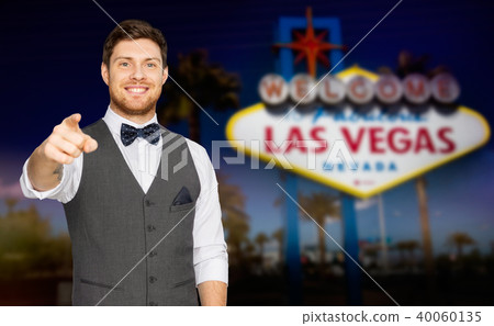 man in suit pointing finger at you at las vegas