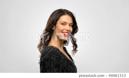 happy beautiful young woman in black party dress happy beautiful young woman in black party dress 40061313
