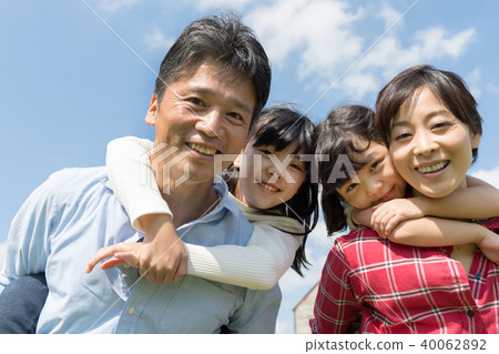 Family Blue Sky Outdoor Family Image 40062892