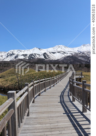 Road leading to Shiretoko mountain range Road leading to Shiretoko mountain range 40063818