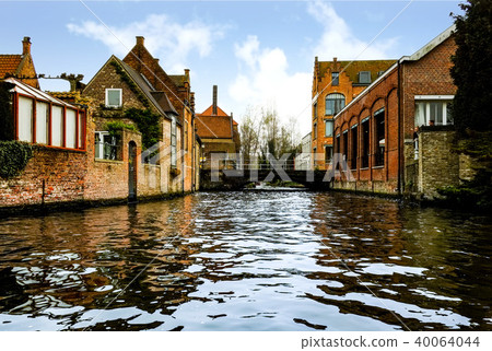 Bruges cityscape seen from a canal 40064044