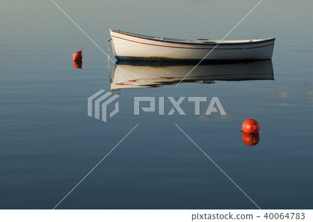 Boat with red floats in the lake Boat with red floats in the lake 40064783
