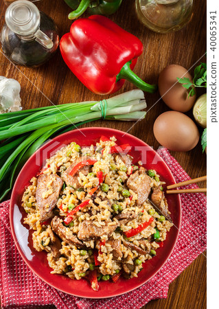 Fried rice with chicken and vegetables Fried rice with chicken and vegetables 40065341
