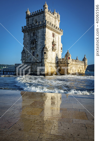 Vertical view of the Belem tower and reflection at the riverside of Tejo River 40065566