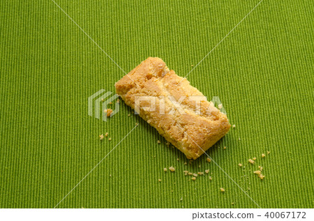 Apple strudel crispy pies on green tablecloth Apple strudel crispy pies on green tablecloth 40067172