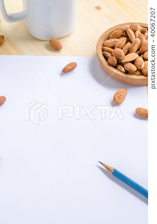 Almond snack on wooden table Almond snack on wooden table 40067207