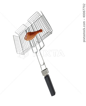 Grilling basket with chicken meet isolated 40067702