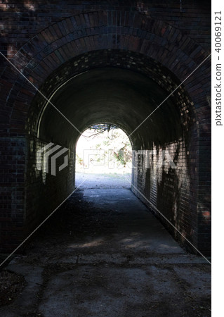 Old tunnel and the world beyond it Old tunnel and the world beyond it 40069121