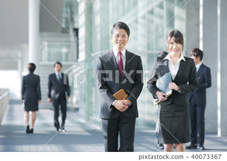 Innocent adult business man and woman two businessmen Business scene Office scene 40073367