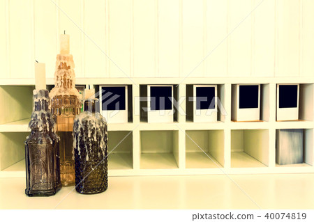 Bottles with a candle 40074819