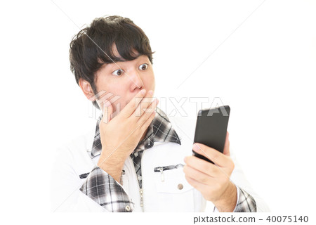 A man with a surprised expression 40075140