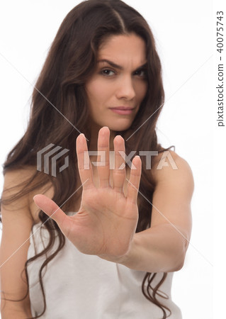 Portrait of an angry brunette woman Portrait of an angry brunette woman 40075743
