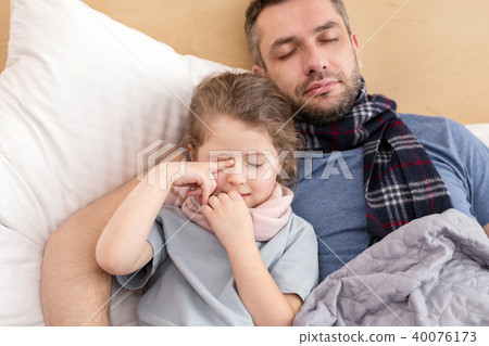 Sick daddy and daughter sleeping together  40076173