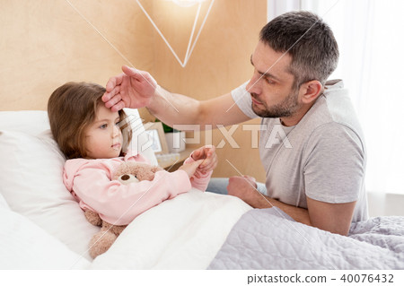 Wonderful sweet girl lying in bed 40076432