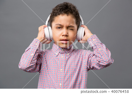 Cute nice boy wearing headphones Cute nice boy wearing headphones 40076458