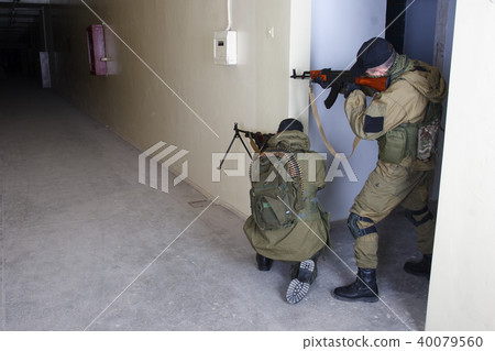 insurgents with AK 47 and gun 40079560