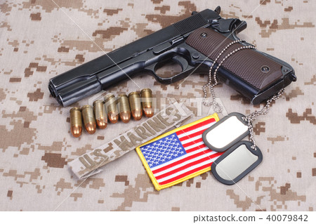 colt 1911 handgun on USMC camouflage uniform 40079842