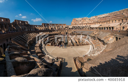 Tourist inside Rome Colosseum Italy 40085918