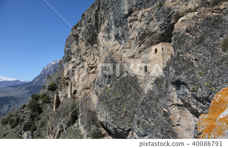 Ancient rock fortress in the Ursdon gorge, Russia 40086791