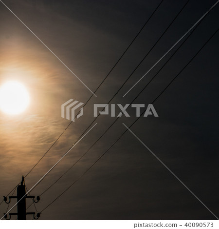 Evening sun at sunset and wires silhouette Evening sun at sunset and wires silhouette 40090573
