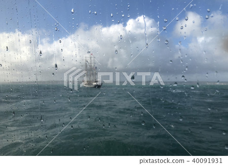 View of the ocean and ship Belem through a window View of the ocean and ship Belem through a window 40091931