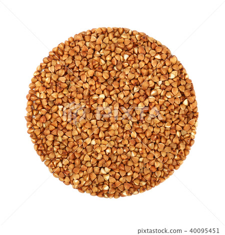 Round shaped dried buckwheat isolated on white Round shaped dried buckwheat isolated on white 40095451