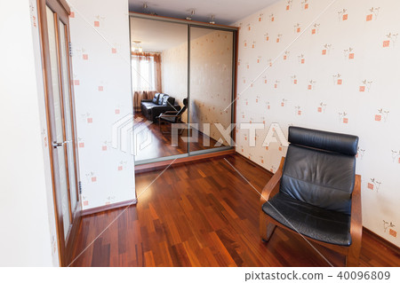 Living room interior with black leather chair 40096809