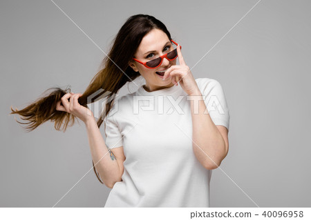 Attractive overweight woman in sunglasses Attractive overweight woman in sunglasses 40096958