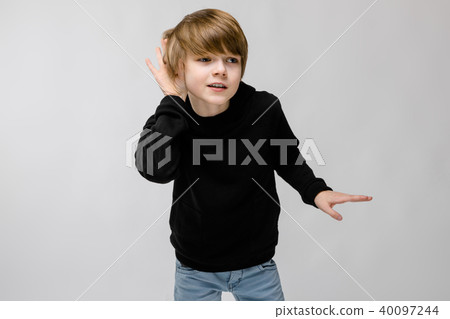Teenage boy in fashionable clothes Teenage boy in fashionable clothes 40097244
