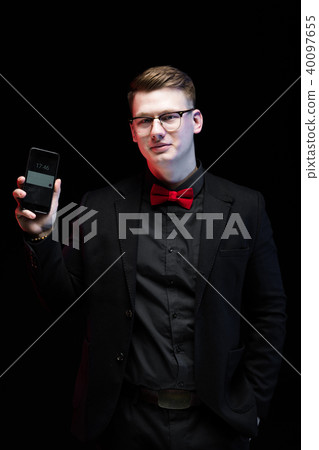Portrait of confident handsome ambitious happy elegant responsible businessman showing mobile phone Portrait of confident handsome ambitious happy elegant responsible businessman showing mobile phone 40097655