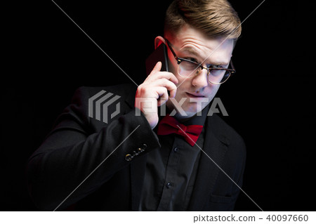 Portrait of confident handsome ambitious happy elegant responsible businessman talking on phone on Portrait of confident handsome ambitious happy elegant responsible businessman talking on phone on 40097660