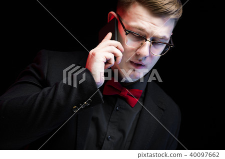 Portrait of confident handsome ambitious happy elegant responsible businessman talking on phone on Portrait of confident handsome ambitious happy elegant responsible businessman talking on phone on 40097662