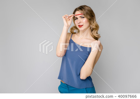 Attractive woman in fashionable clothes Attractive woman in fashionable clothes 40097666