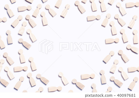 Wooden figures of people on a white background.  40097681