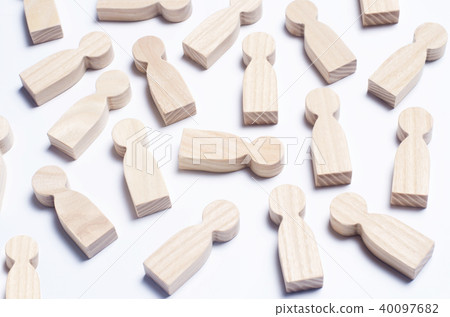 Wooden figures of people on a white background.  40097682