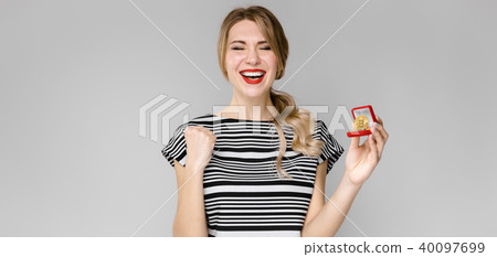 Excited woman with gift box 40097699