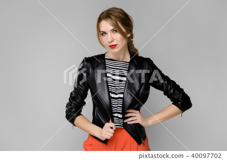 Attractive woman in fashionable clothes Attractive woman in fashionable clothes 40097702