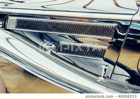 close up of the side parts on a sport vintage automobile close up of the side parts on a sport vintage automobile 40098553