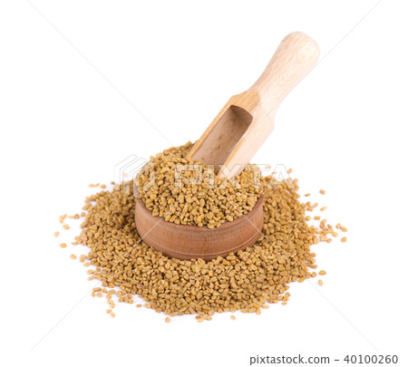 Fenugreek seeds in wooden spoon, isolated on white background 40100260